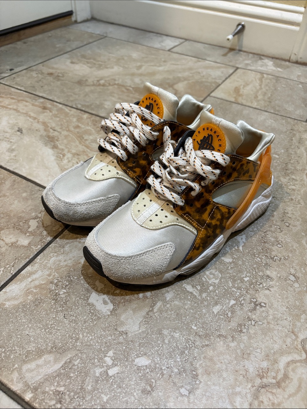 Nike Huarache Women’s Beige and Orange Leopard Accent Sneakers